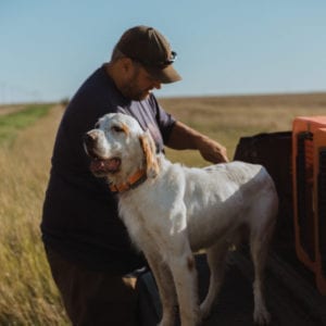 Tyler Website of Birds, Booze, and Buds Podcast with a bird dog.